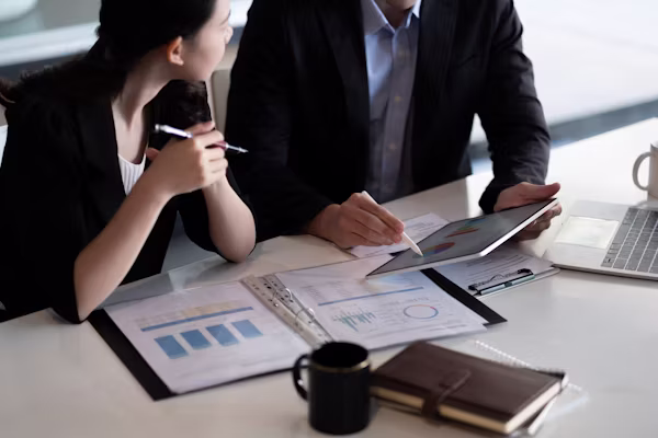 Business consultant reviewing growth strategy and financials